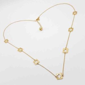 Long Kate Spade Logo Spade Necklace